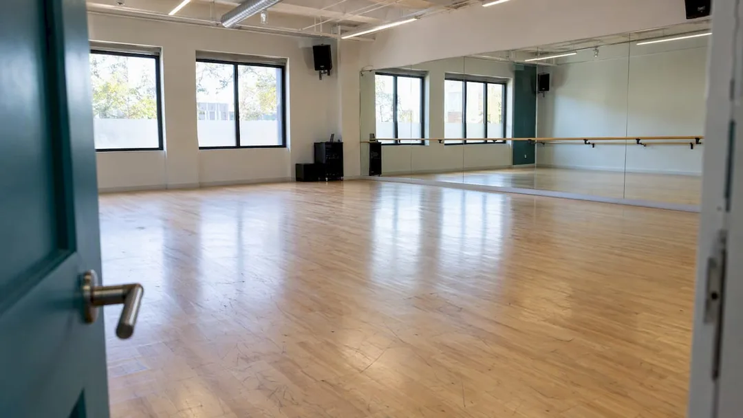 Dance studio floor, mirrors and sound system